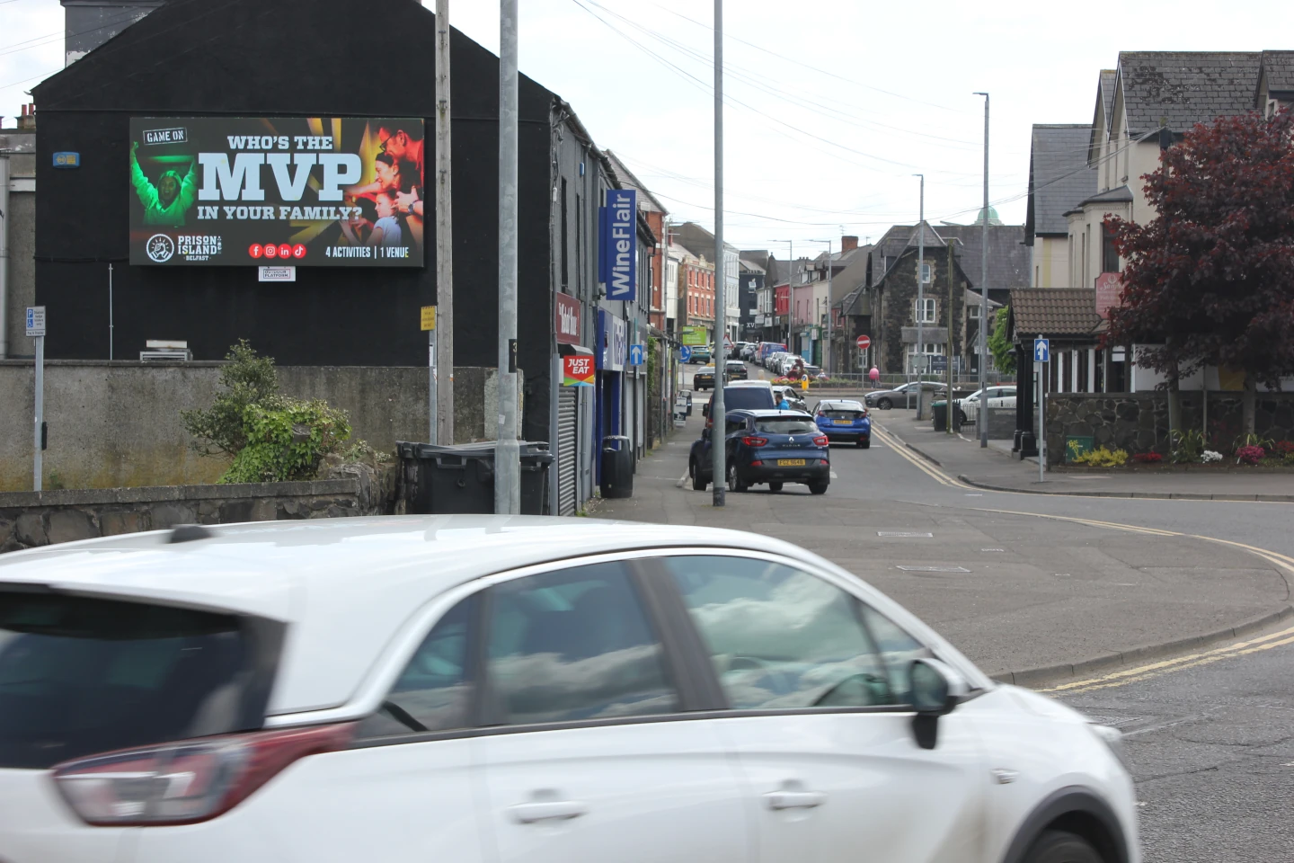 Wide shot of Prison Island DOOH advertisement in Ballymena